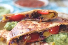 Vegan quesadilla on a yellow plate.