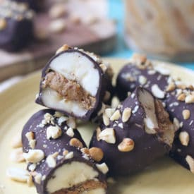 Banana chocolate bars served on a yellow plate.