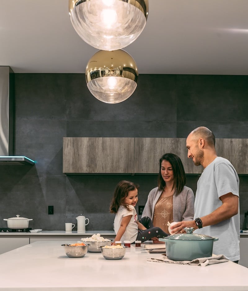 Family cooking in kitchen