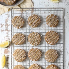 Lemon poppyseed cookies on a cooling rack.