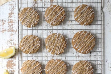 Lemon poppyseed cookies on a cooling rack.