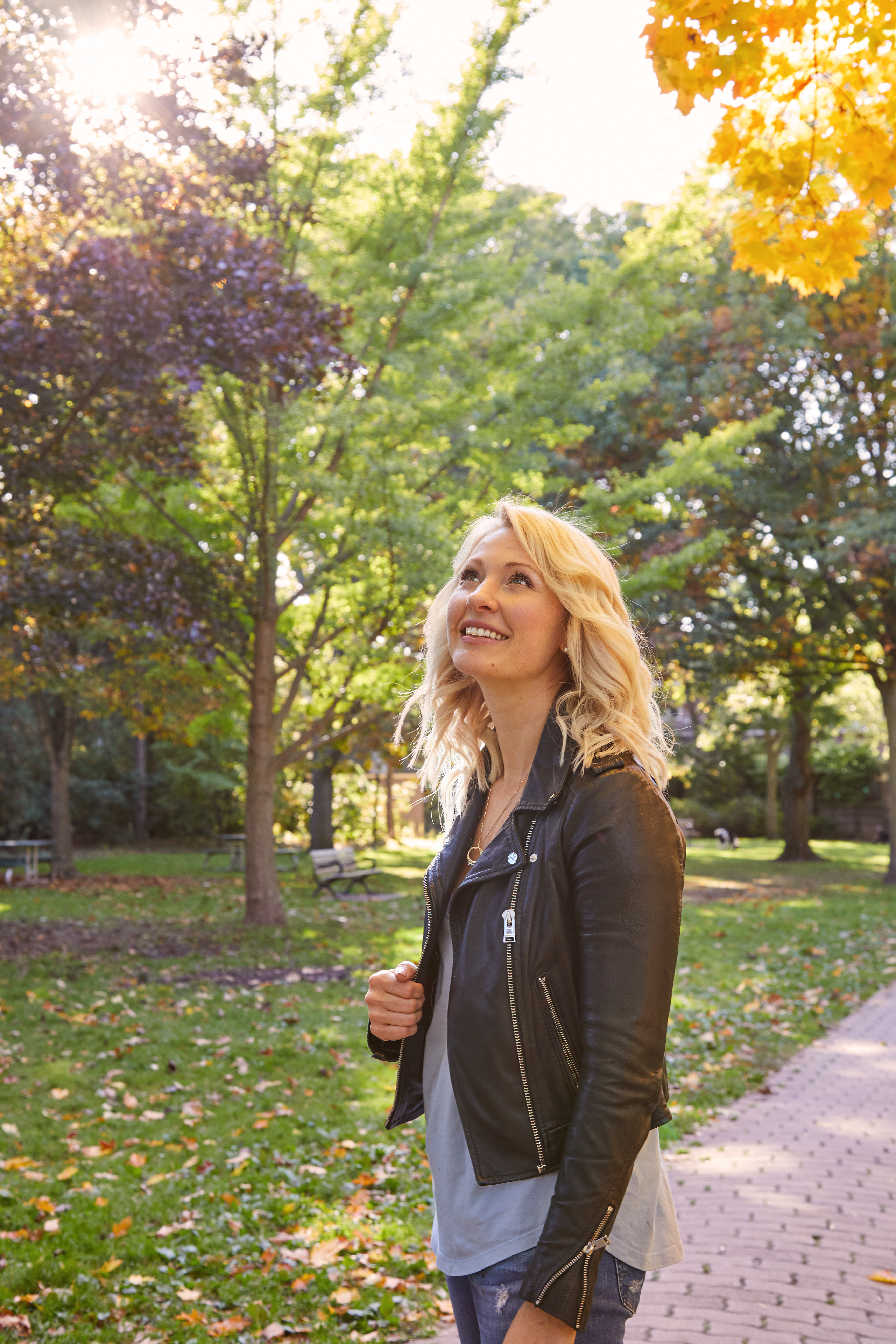 Women standing in a park. 