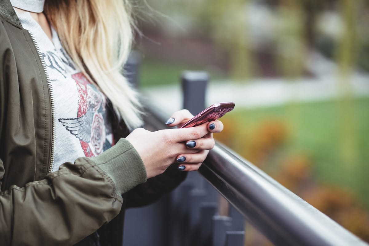 Women on her cellphone.