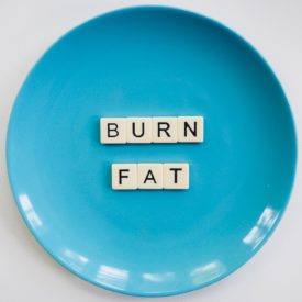 Blue plate with the words burn fat.