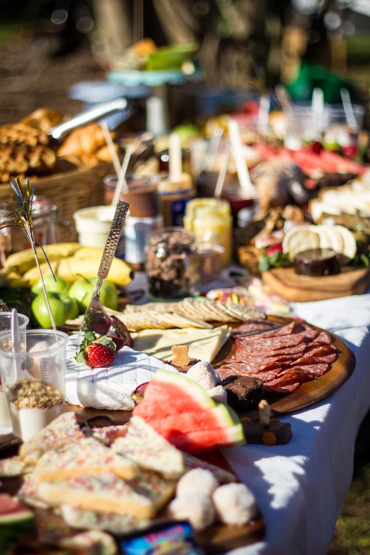 image of a table filled with multiple plates of food