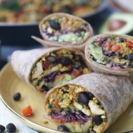 vegetarian burritos on a plate.