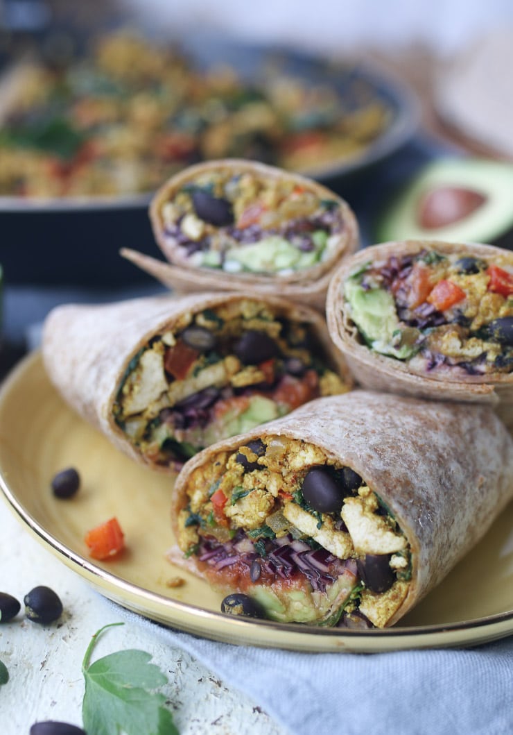 Vegan breakfast burritos on a plate.