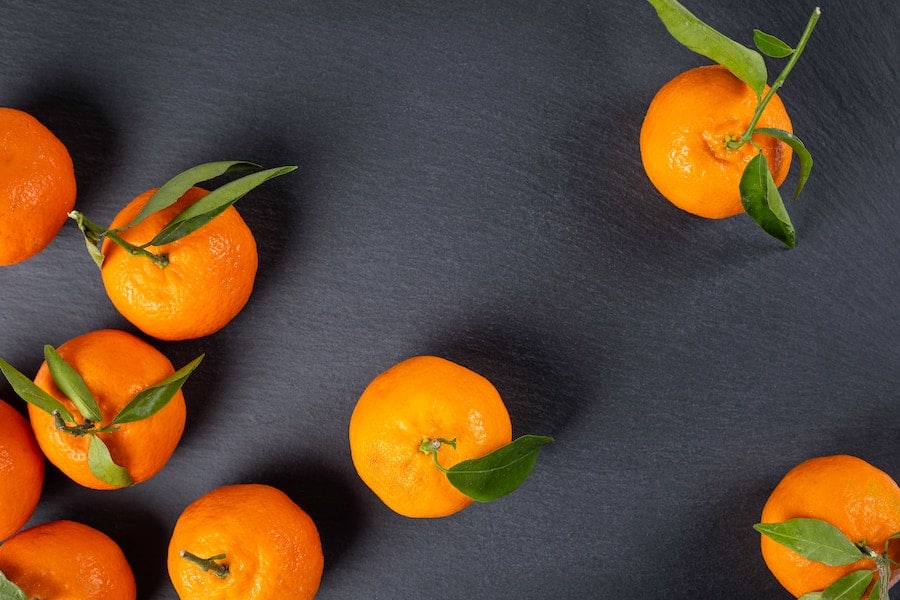 oranges on a grey background