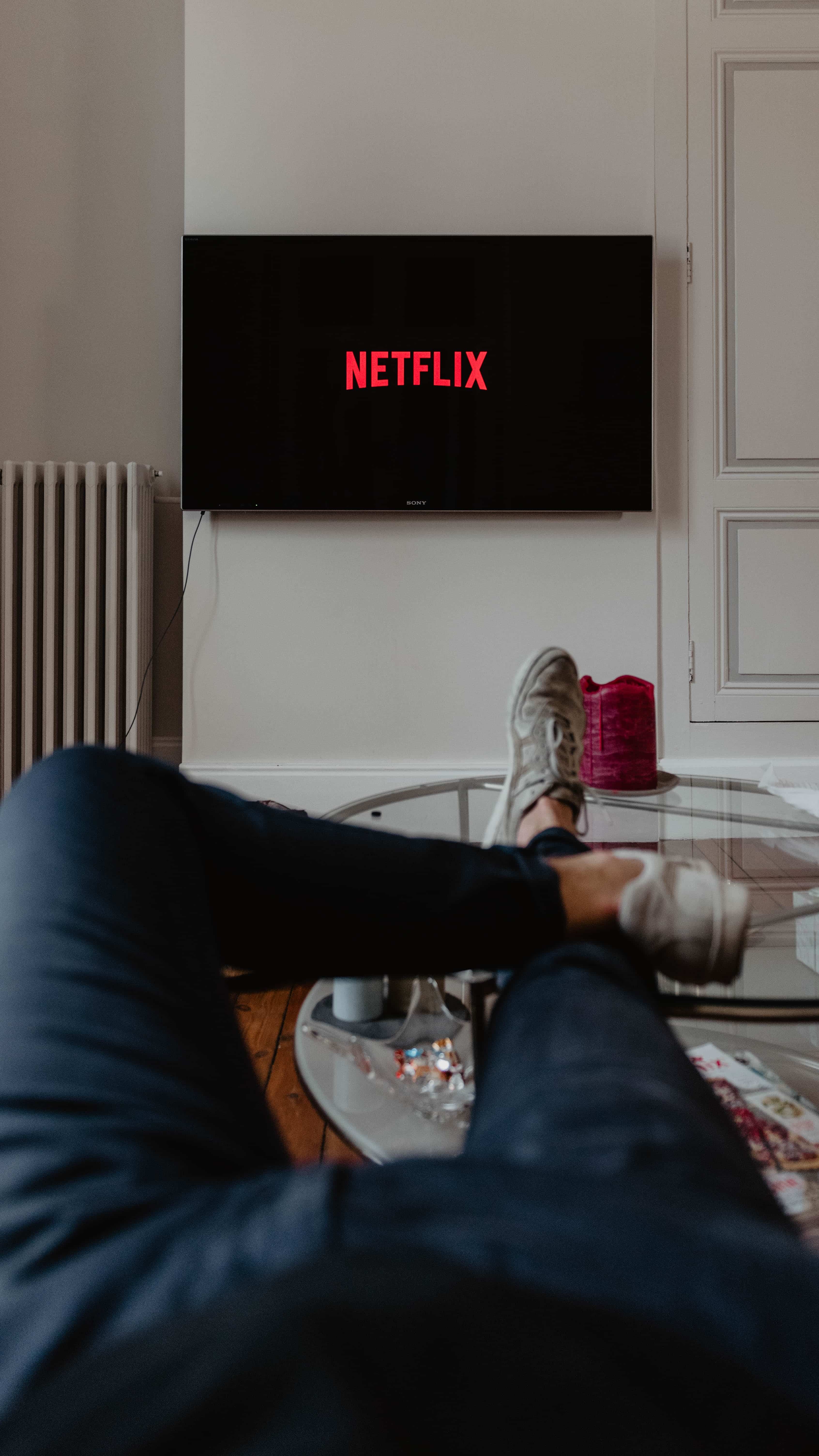 Person sitting watching Netflix