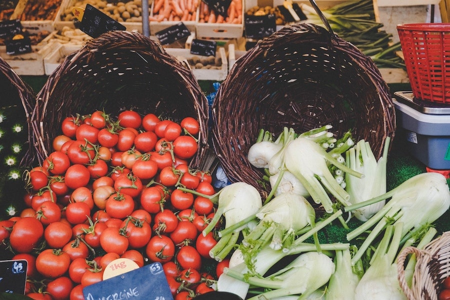 Tomatoes and fennel at a market. 