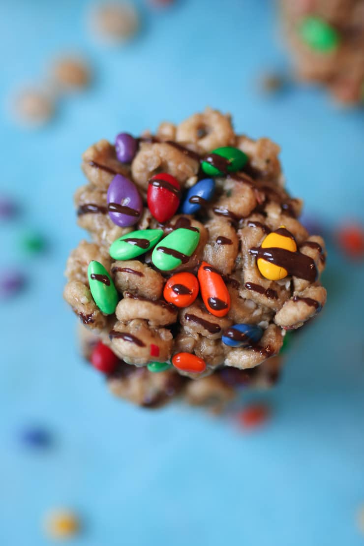 Birds eye view of no bake Cheerios bars with blue background.