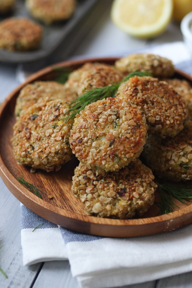 Fish cakes served on a wooden plate. 