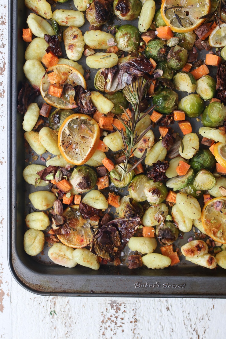 birds eye view of Gnocchi and vegetables on a sheet pan. 