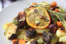 Gnocchi and vegetables on a plate.