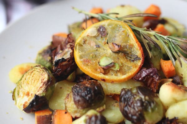 Gnocchi and vegetables on a plate.