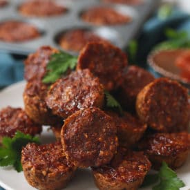 Plate filled with vegan lentil mini meatloaf muffin