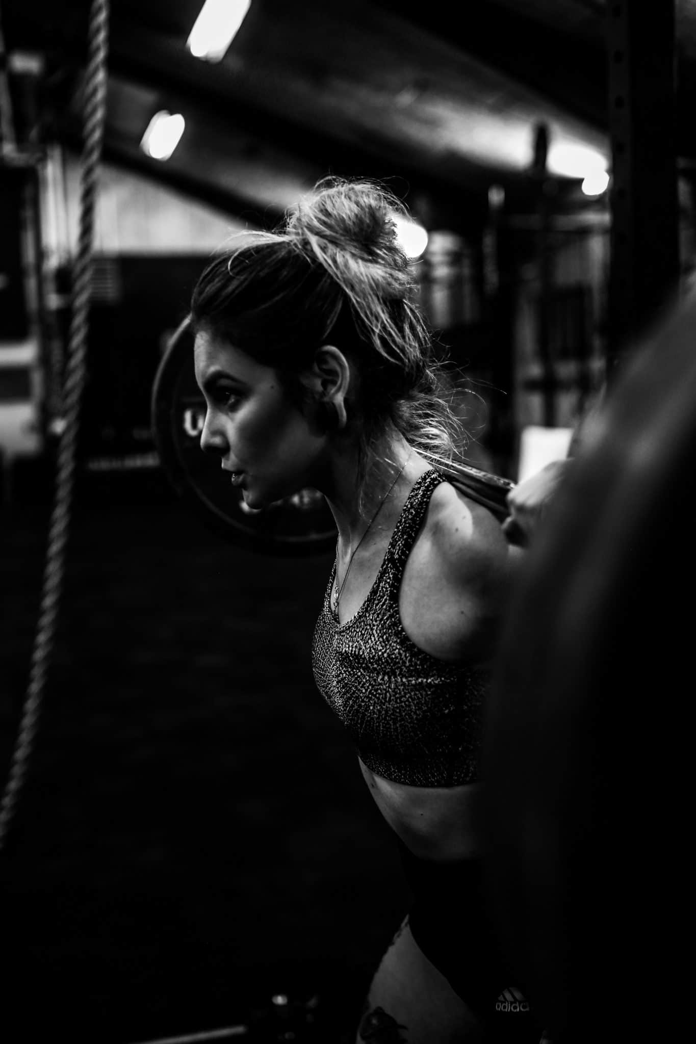 Female bodybuilding lifting a weight 