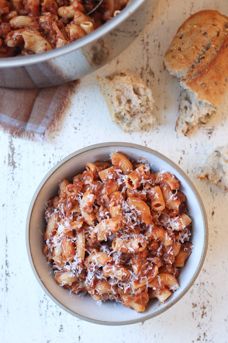 Birdseye view of vegan beefaroni in a white bowl.