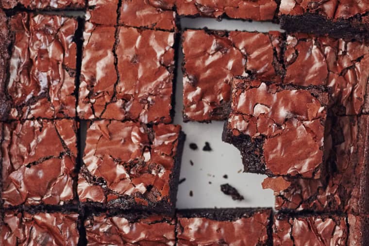 birds eye view of a tray containing pantry staple cocoa brownies 