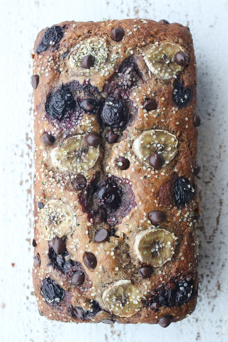 birds eye view of banana split flavoured chocolate chip banana bread garnished with hemp hearts