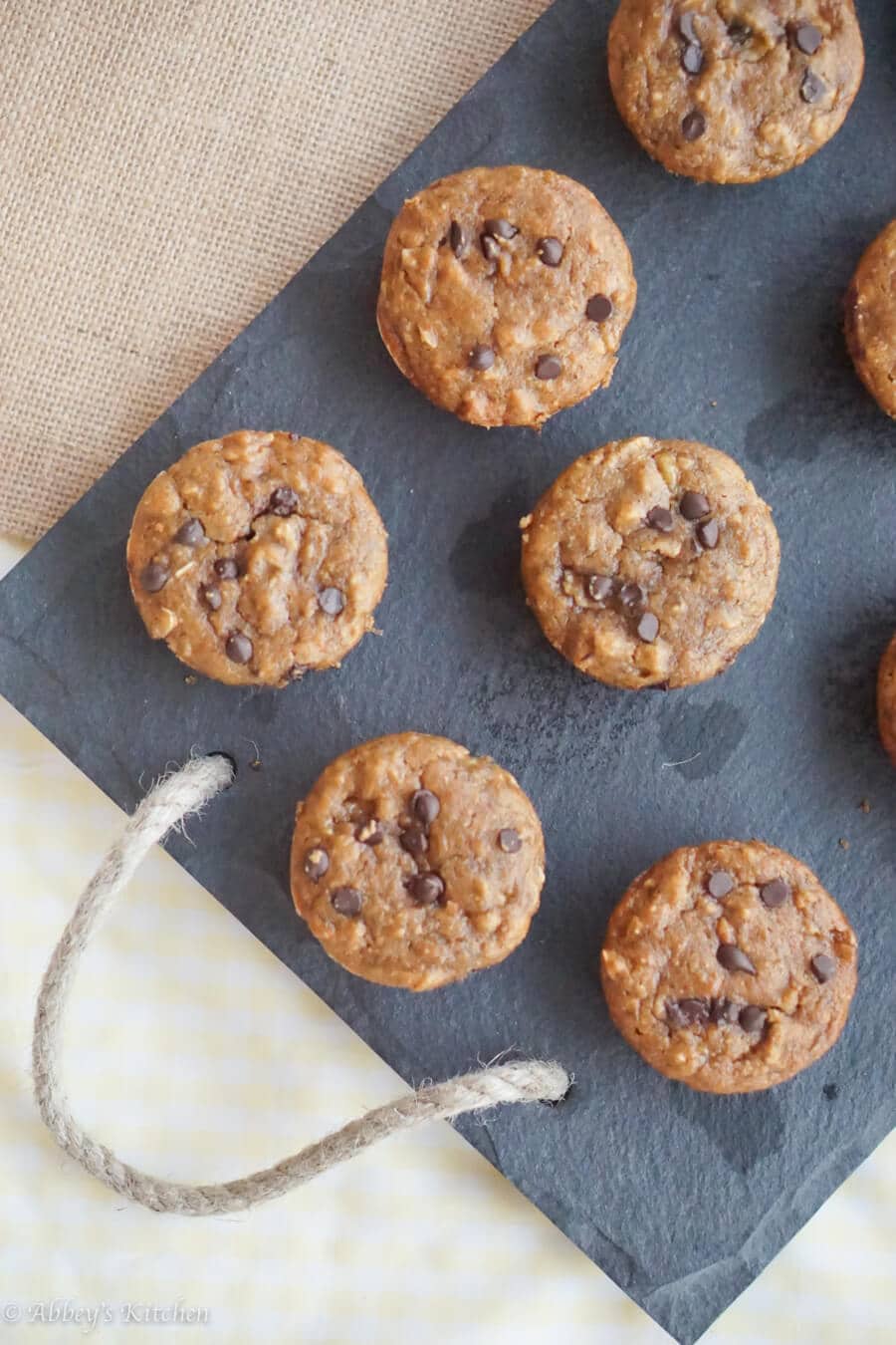 chocolate chip banana muffins on a grey tray using pantry staples 