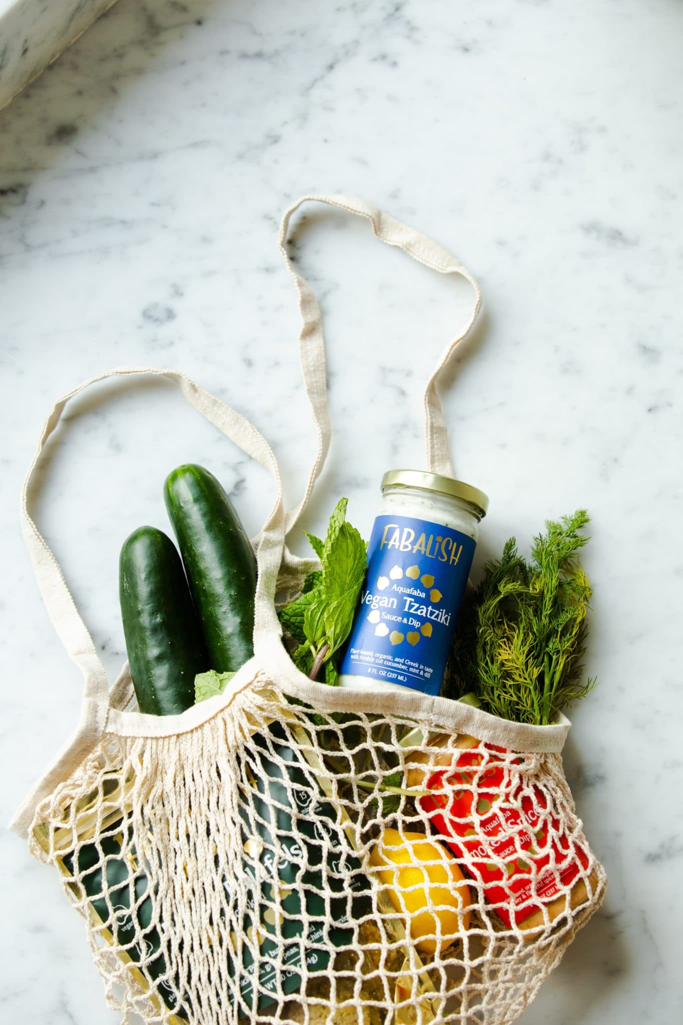 image of grocery bag with a variety of produce 