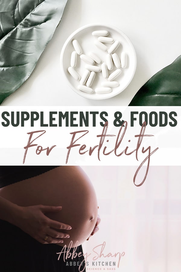 pinterest image of white fertility supplements in a white bowl on a white table with two green plants above a photo of a pregnant woman standing sideways holding her stomach with text overlay