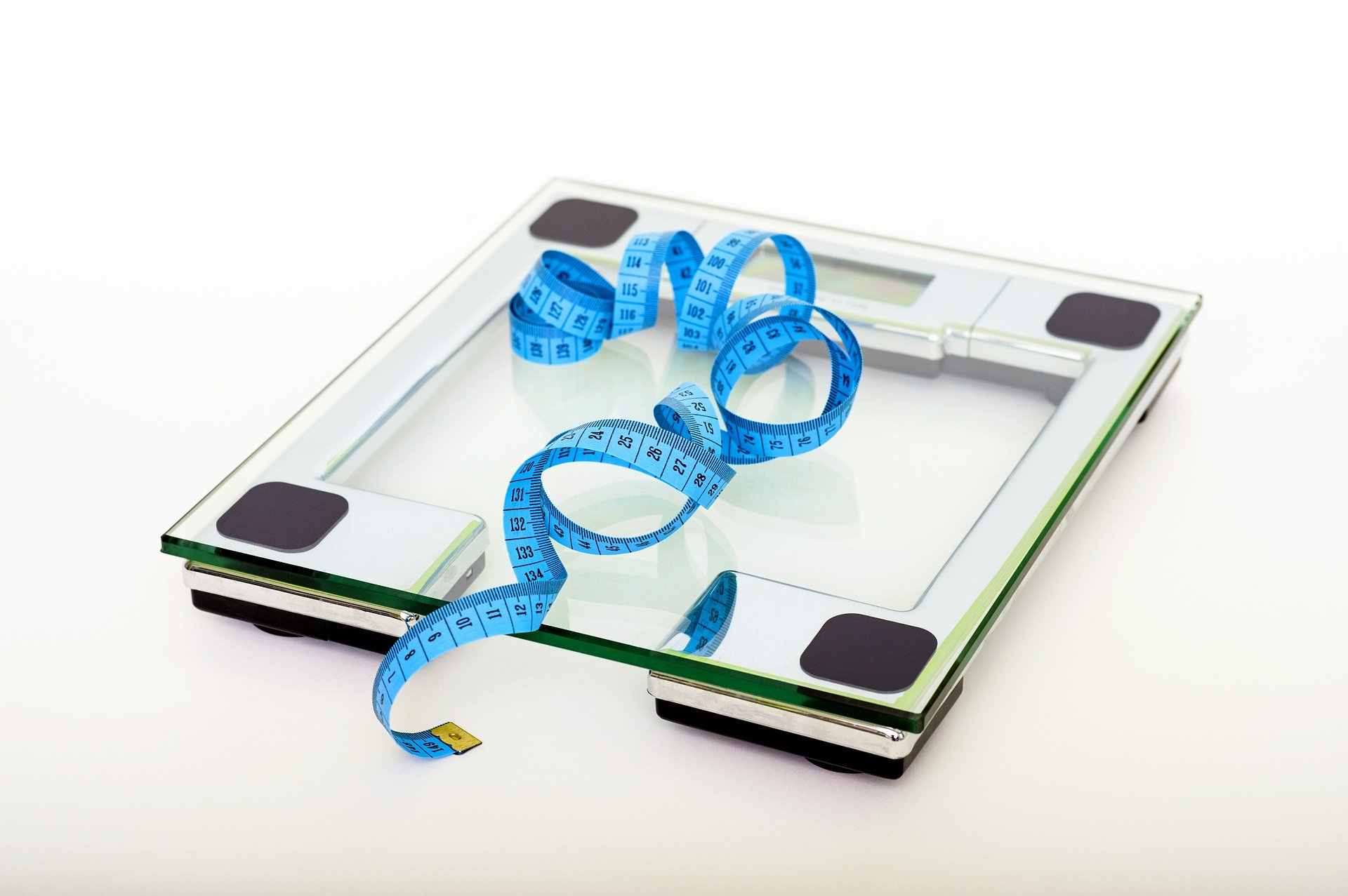 measuring tape and scale to track bariatric surgery results 