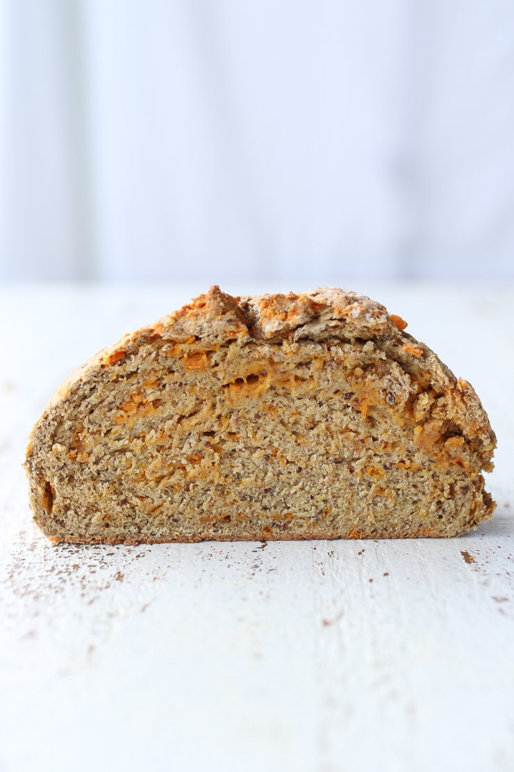 A slice of cheesy vegan soda bread.