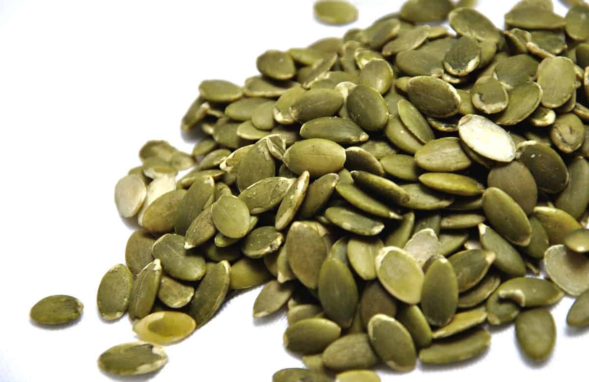 Several pumpkin seeds for seed cycling.