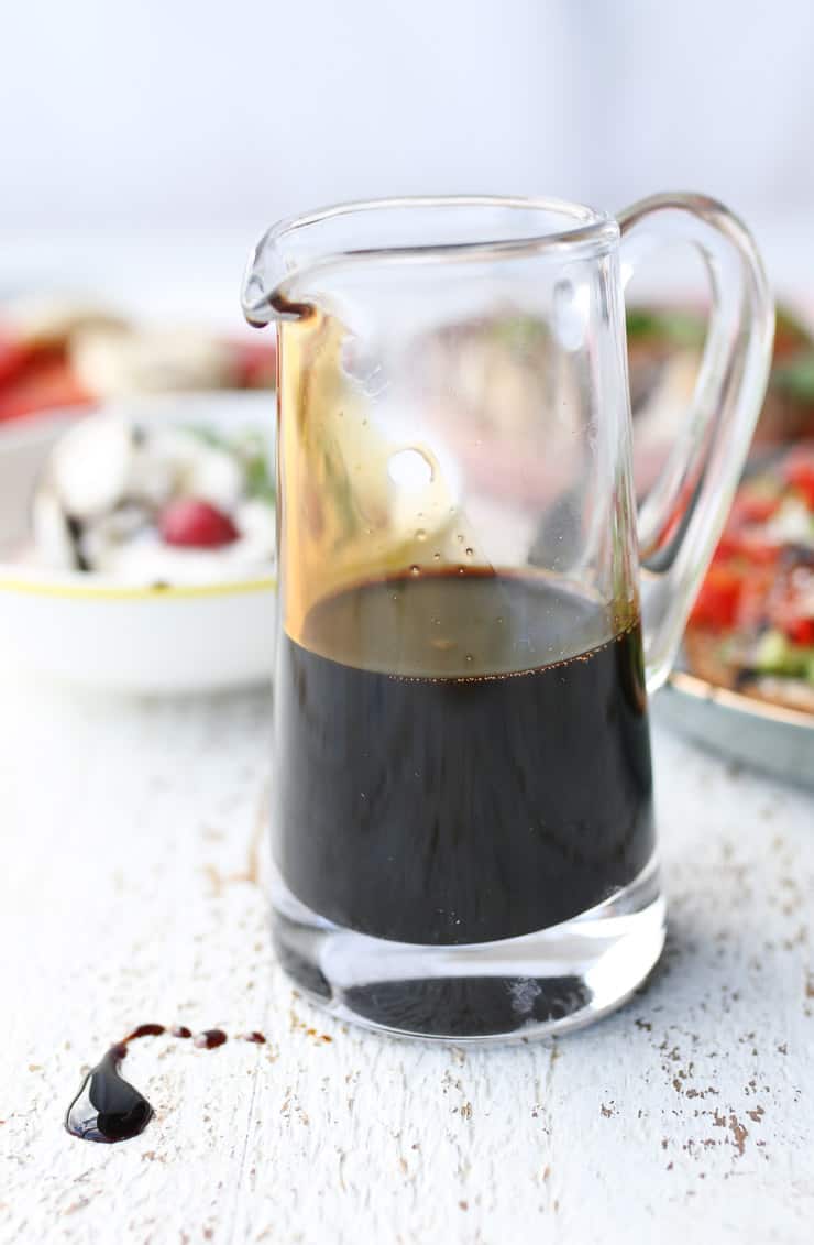 balsamic glaze in a clear pitcher 