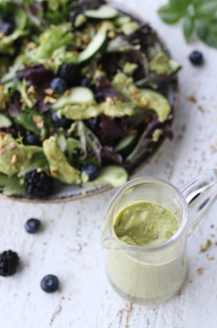 Birds eye view of salad served with avocado salad dressing recipe.