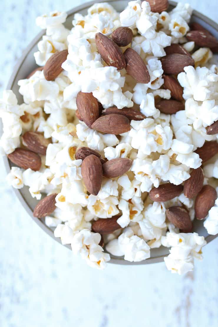 popcorn and almonds mixed together for a healthy snack to manage blood sugar levels 