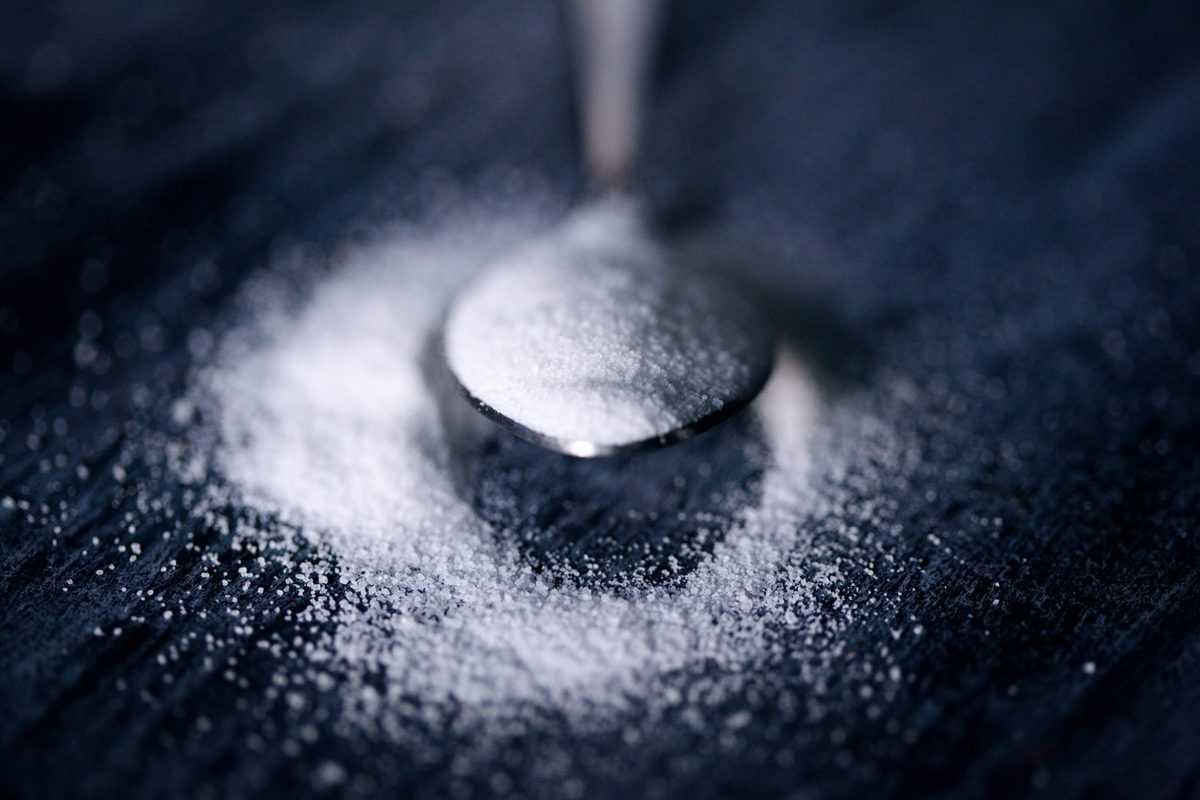 image of sugar on a spoon 