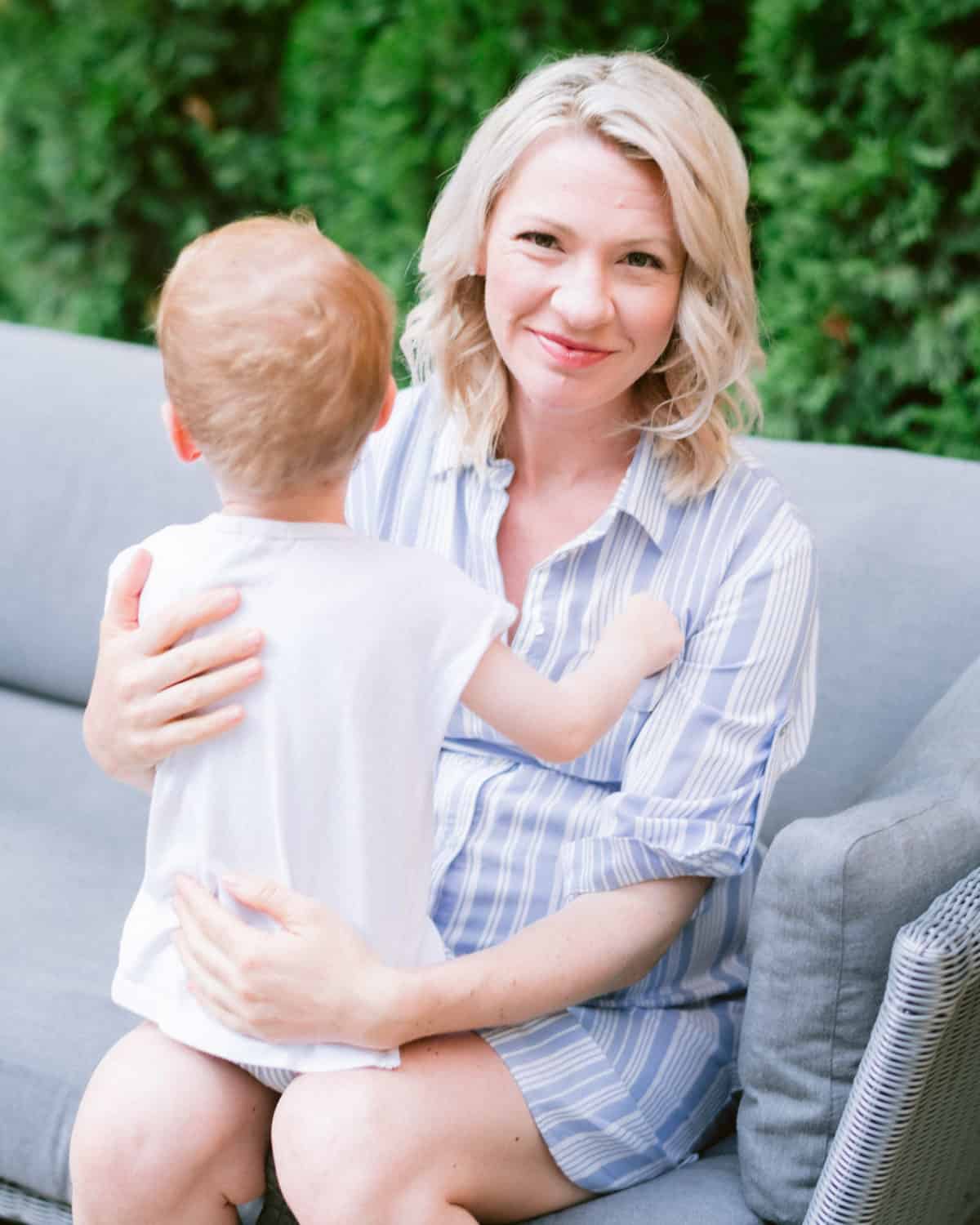 Big Boy E sitting on Abbey's lap