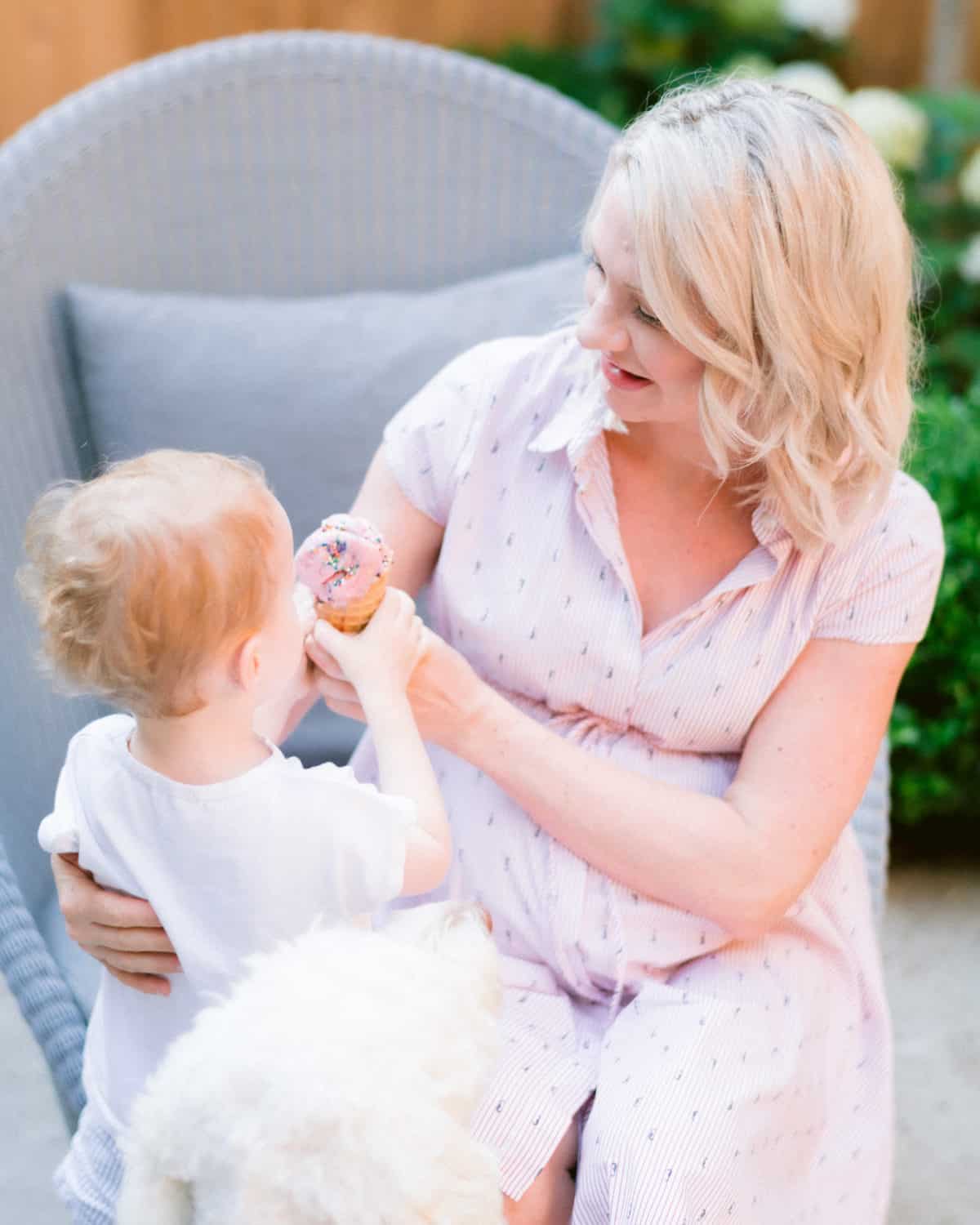 Abbey sharing an ice cream cone with Baby E