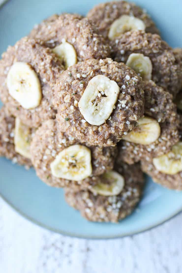 Birds eye view of banana vegan oatmeal cookies on a blue plate.