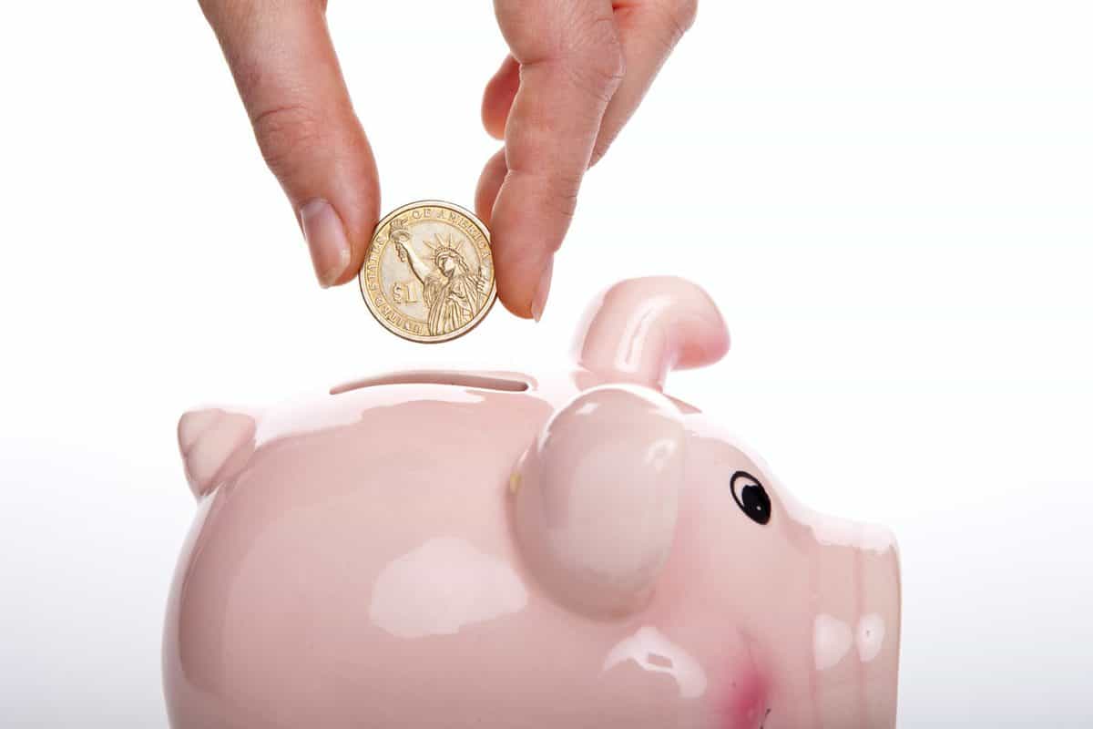 a pink piggy bank to plan for financial future