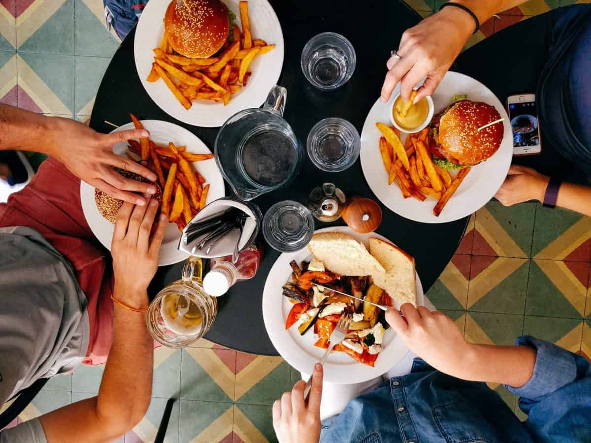 birds eye view of friends having keto cheat days 