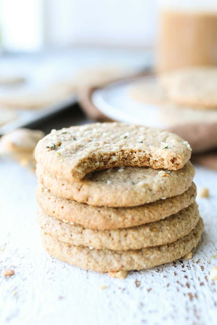 Five peanut butter cookies stacked on top of on another.