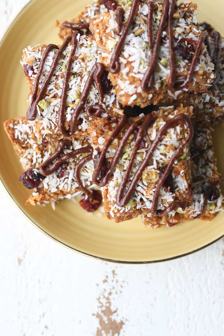 Birds eye view of breakfast bars on a yellow plate.