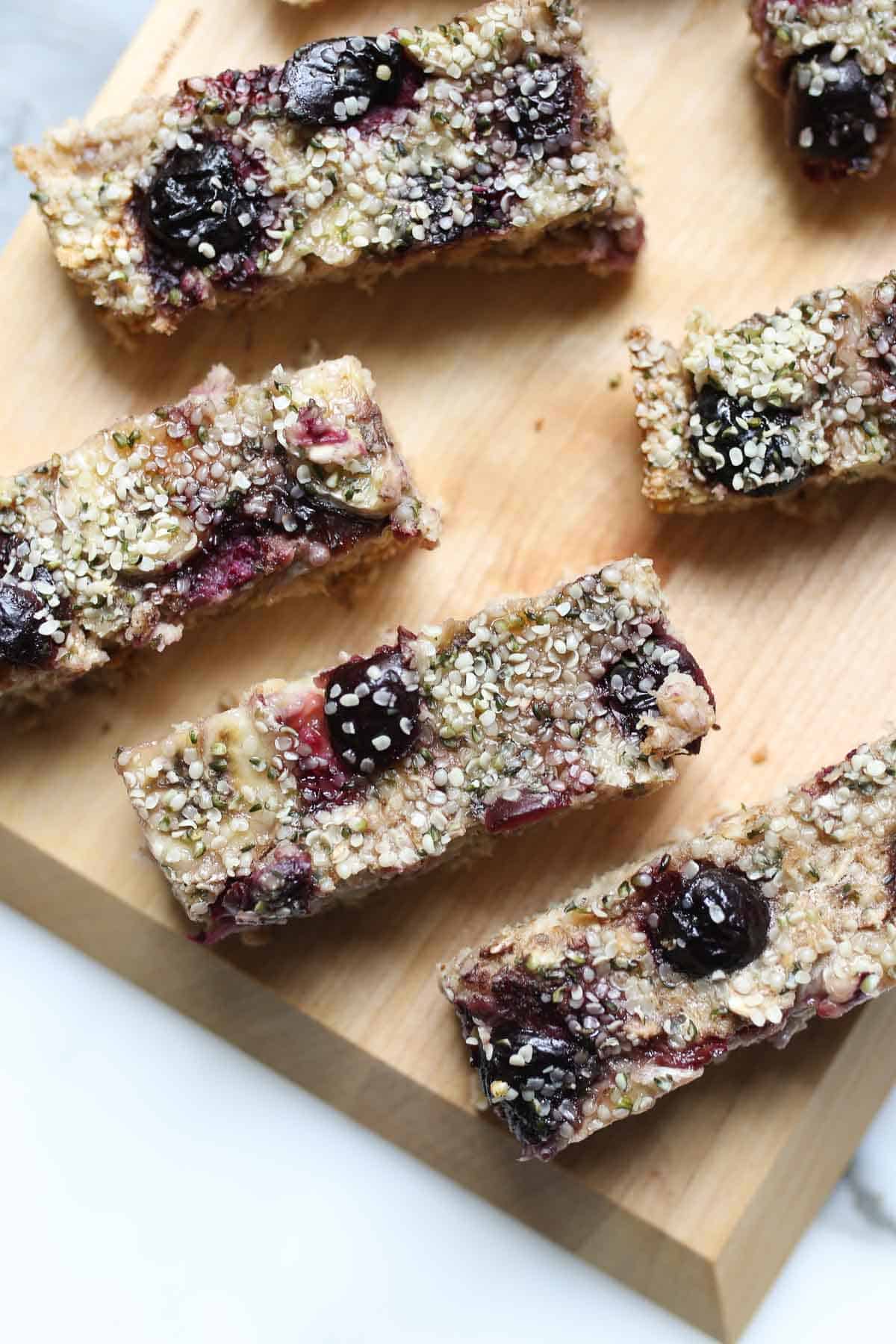 Several baby led weaning fingers cut into strips on a cutting board. 