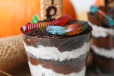 halloween dirt cup with pumpkin in the background