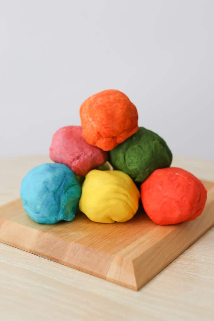 several rolls of homemade play dough stacked on top of one another