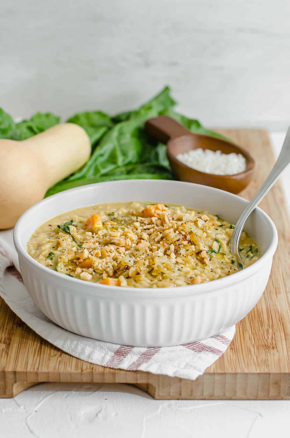 Vegan risotto in a white bowl. 