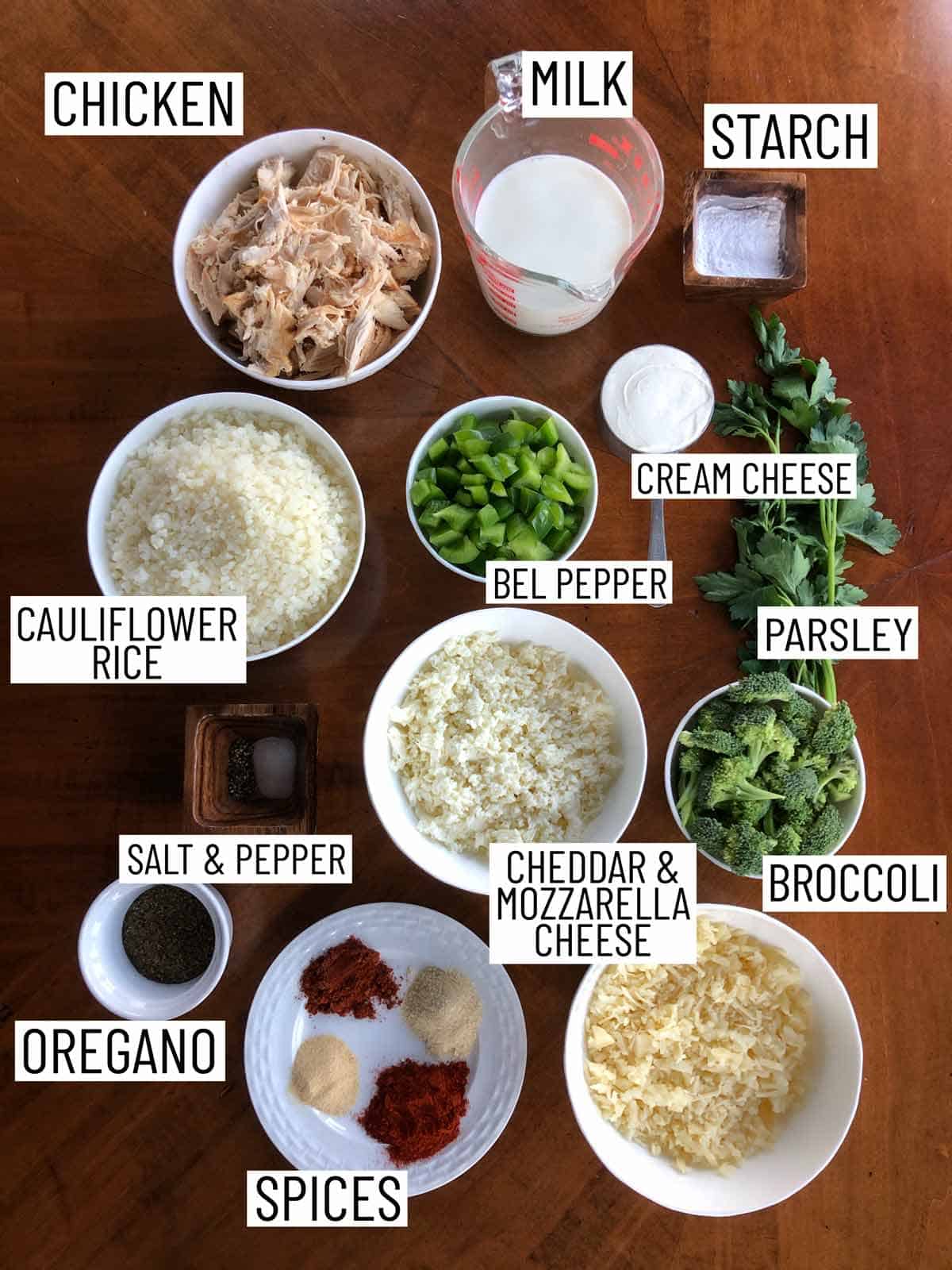 Overhead image of ingredients requires to make a cauliflower rice casserole.