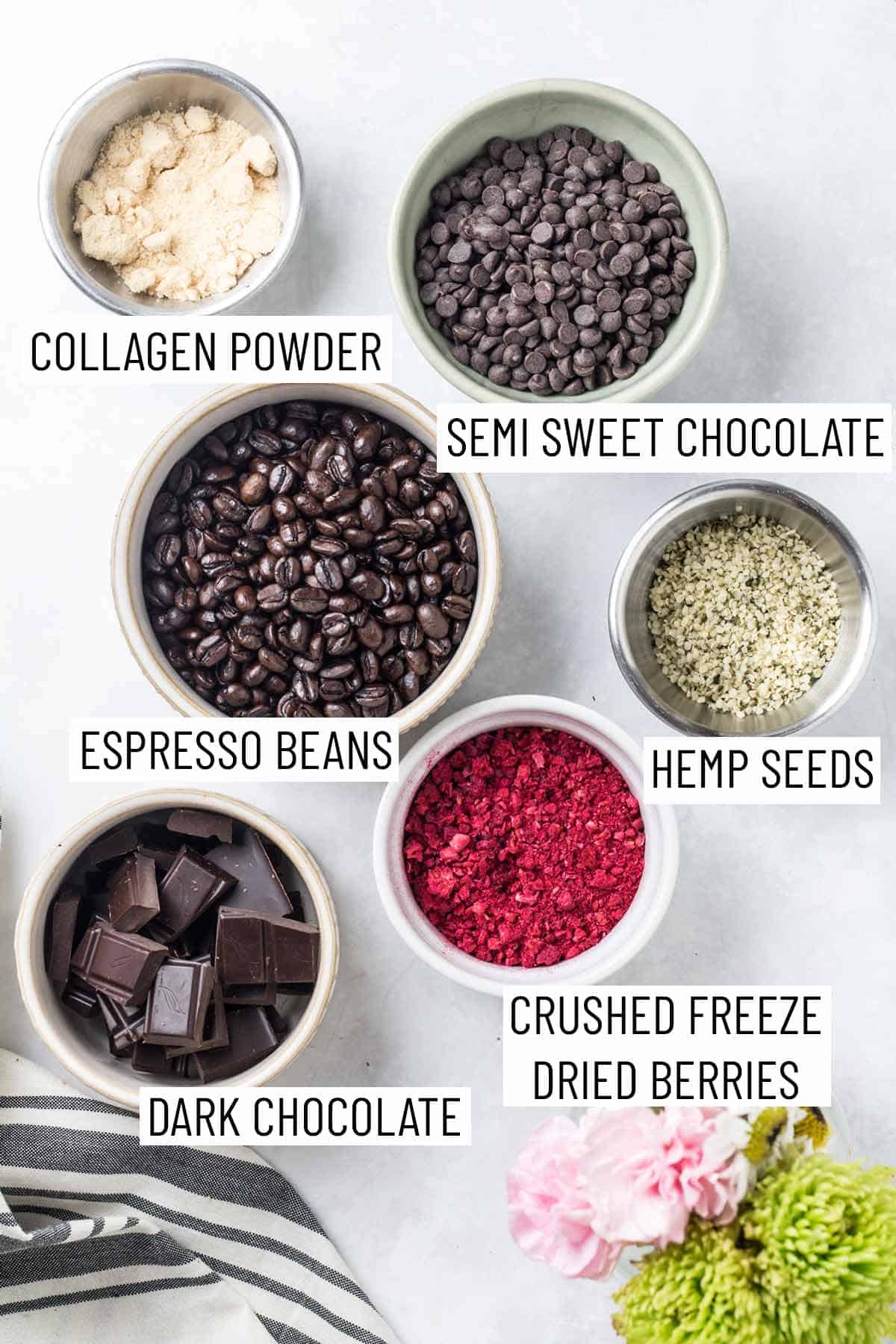 Ingredients for making homemade chocolate covered espresso beans as well as bowls of topping options.