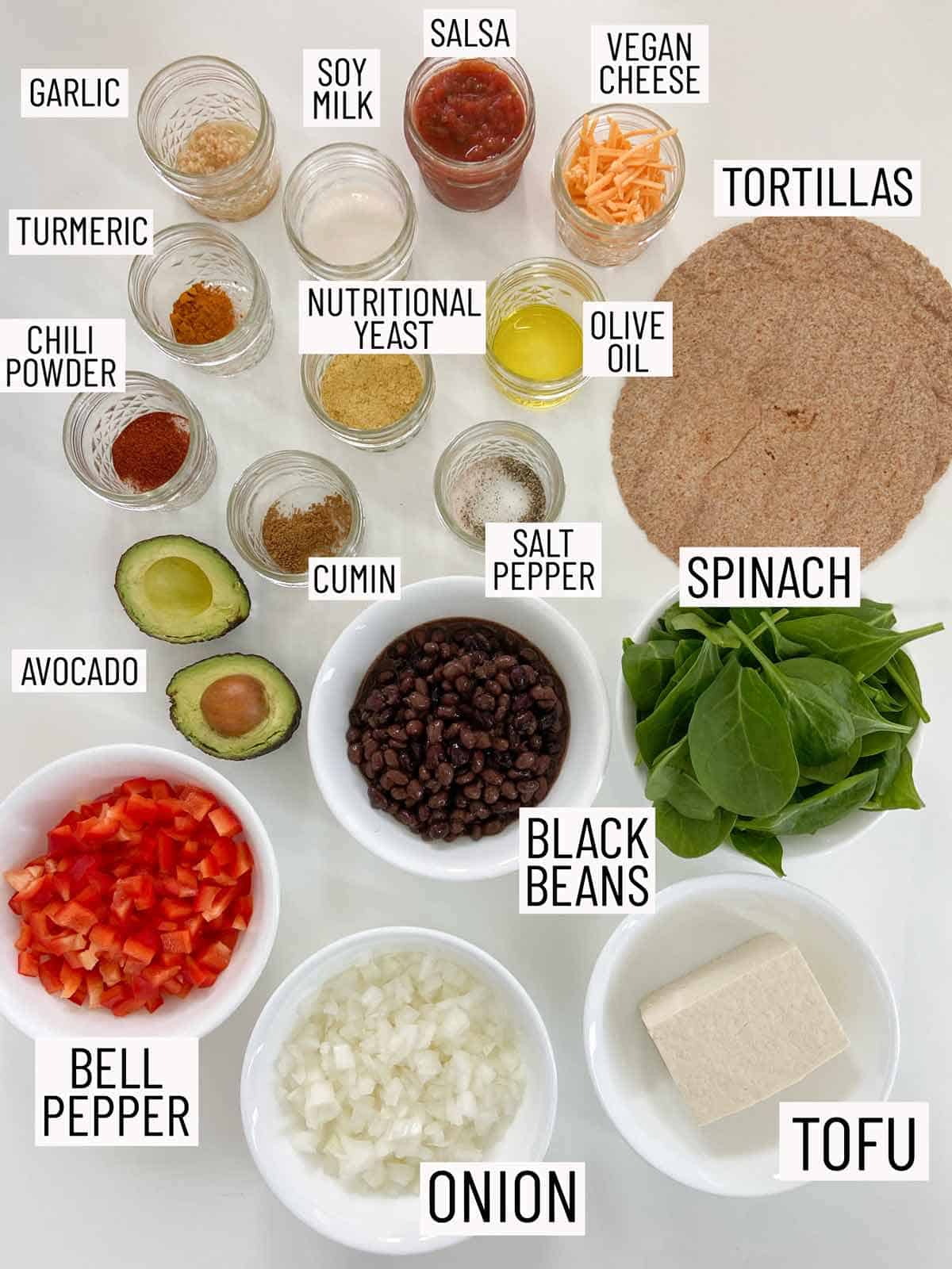 Overhead photo of ingredients needed to make vegan breakfast burritos.