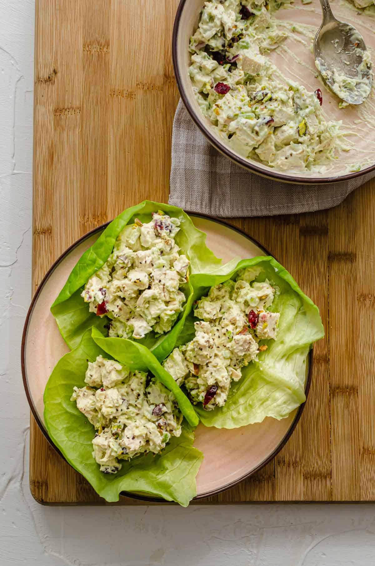 Birds eye view of cranberry chicken salad in lettuce cups.