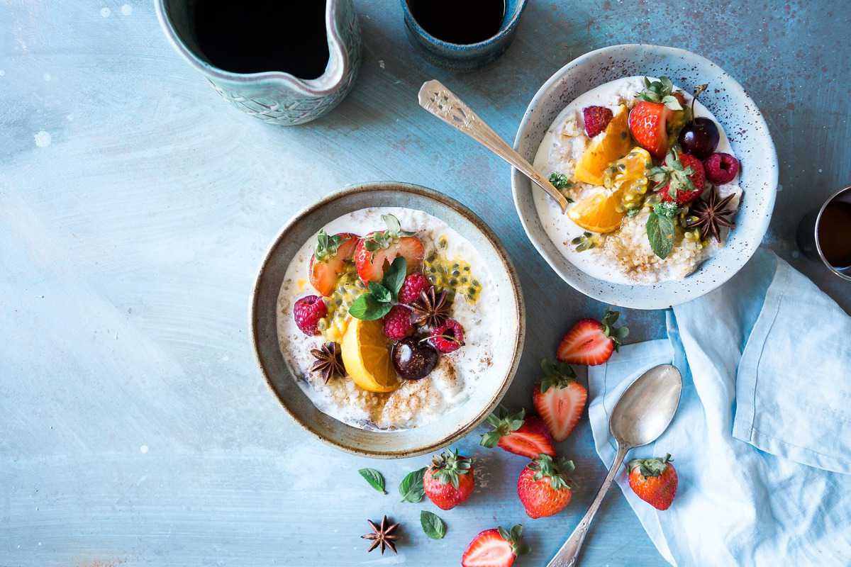 Birds eye view of two bowls of yogurt for the endometriosis diet.